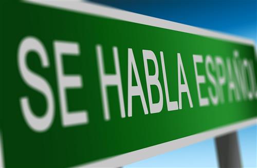Spanish is spoken here 